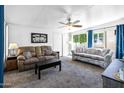 Bright and airy living room with comfortable seating and ample natural light at 111 S Greenfield Rd # 190, Mesa, AZ 85206