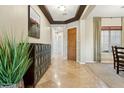 Elegant foyer with tile flooring, neutral walls, and tasteful decor at 27308 N 56Th Dr, Phoenix, AZ 85083