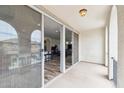 Balcony with views of interior and access to kitchen through sliding glass doors providing a great view to the interior at 4353 E Erie St, Gilbert, AZ 85295
