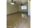 Spacious living room featuring tile floors and a window at 8110 N 31St Dr, Phoenix, AZ 85051