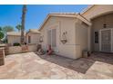 Spacious outdoor patio area with stone flooring and decorative accents at 9563 E Keats Ave, Mesa, AZ 85209
