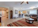 Spacious living area with a seamless flow to the kitchen and dining space at 102 W Raven Dr, Chandler, AZ 85286