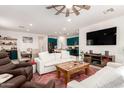 Inviting living room featuring an open floor plan, comfortable seating, and contemporary décor at 1736 E Joelle Dr, Casa Grande, AZ 85122