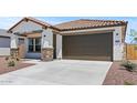 Nice single-Gathering home with a tile roof and a two-car garage at 3913 S 233Rd Ln, Buckeye, AZ 85326