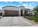 Charming single-story home with a well-manicured lawn and covered patio area at 5341 W Alta Mesa Ave, Laveen, AZ 85339