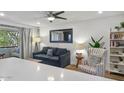 Cozy living room with a large window and comfortable seating at 7625 E Camelback Rd # 310B, Scottsdale, AZ 85251