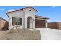Inviting single-story home with a tile roof, stucco, and a two-car garage in a desirable neighborhood at 7638 W Park St, Laveen, AZ 85339