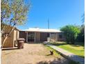 View of house showing desert landscaping and front patio at 8527 W Jefferson St, Peoria, AZ 85345