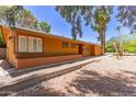 Charming home with manicured landscaping, a well-maintained lawn, and inviting curb appeal at 1417 W Rose Ln, Phoenix, AZ 85013