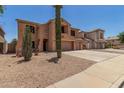 Lovely two-story home with a two-car garage and xeriscaped front yard at 18903 N Shelby Dr, Maricopa, AZ 85138