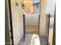 Gated front entry with desert landscaping at 244 E Ponderosa Ln, Phoenix, AZ 85022