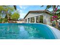 Inviting above-ground pool in a private backyard setting. Can be removed if buyer(s) desire at 4073 E Stable Ct, Gilbert, AZ 85297