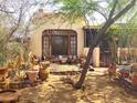 Backyard with desert landscaping, showcasing a quaint and peaceful outdoor space at 717 W Lynwood St, Phoenix, AZ 85007