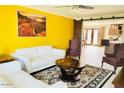 Bright living room featuring yellow accent wall and comfortable seating at 133 W Balboa Dr, Tempe, AZ 85282