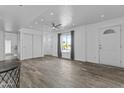 Inviting living room with modern floors, neutral paint, and lots of natural light at 3754 W Hearn Rd, Phoenix, AZ 85053