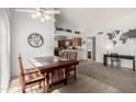 Dining Room with a table, chairs, and tile floors that offers great natural light from the window at 4102 W Bluefield Ave, Glendale, AZ 85308