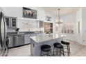 Stylish eat-in kitchen with granite counters and stainless steel appliances at 30645 N 44Th St, Cave Creek, AZ 85331