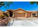 Charming home with a well-manicured front yard and a spacious three-car garage at 5912 W Gail Dr, Chandler, AZ 85226