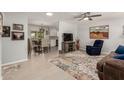Open living room showcasing seamless transition to the dining area and kitchen at 10702 W Salem Dr, Sun City, AZ 85351