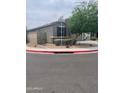 Corner lot property showcasing attractive landscaping and mature trees in a quiet neighborhood at 3211 W Pollack St, Phoenix, AZ 85041