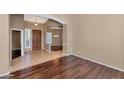 Inviting entryway with wood and tile flooring leading to other living spaces at 4239 W Reddie Loop, Phoenix, AZ 85083