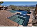 Backyard pool and spa with waterfall feature, brick deck, and stunning mountain views at 10841 N Mountain Vista Mtn, Fountain Hills, AZ 85268