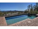 Sparkling pool with beautiful mountain views in a private backyard at 10841 N Mountain Vista Mtn, Fountain Hills, AZ 85268
