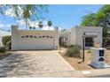 Charming home featuring desert landscaping, a two-car garage, and elegant accents at 113 E Boca Raton Rd, Phoenix, AZ 85022