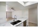 Modern kitchen featuring a sleek countertop, stylish faucet, and stainless steel appliances at 1351 N Pleasant Dr # 1012, Chandler, AZ 85225