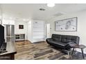 Spacious living room featuring new flooring, modern furnishings, and ample space for relaxation and entertainment at 195 N Cottonwood St # 26, Chandler, AZ 85225