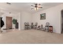 Spacious living room with carpet flooring, neutral walls and ample natural light at 1955 E Grand Canyon Dr, Chandler, AZ 85249
