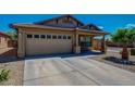 Charming single-story home featuring a well-maintained lawn and attached two-car garage at 3221 W Alta Vista Rd, Phoenix, AZ 85041