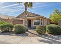 Charming single-story home featuring a well-maintained lawn and attached two-car garage at 3221 W Alta Vista Rd, Phoenix, AZ 85041