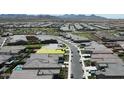 Aerial view of a neighborhood showcasing well-maintained homes and streets at 3885 E Kenley Ln, San Tan Valley, AZ 85143