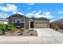 Charming single-Gathering home with a two-car garage and stone accents at 3885 E Kenley Ln, San Tan Valley, AZ 85143