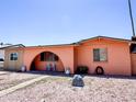 Single-story home featuring low-maintenance landscaping, an arched entryway, and a welcoming facade at 4623 W Mission Ln, Glendale, AZ 85302