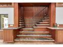 Detailed close-up of the staircase with custom wood and granite accents at 8752 E Range Rider Trl, Mesa, AZ 85207