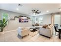 Bright living room featuring modern decor, stylish furnishings, and a cozy, inviting atmosphere at 4046 S 58Th Ln, Phoenix, AZ 85043