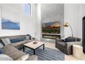 Inviting living room with comfortable seating, a stylish fireplace, and neutral tones at 5401 N 25Th St, Phoenix, AZ 85016