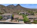 Beautiful aerial view of house with mountain in the background at 6133 W Fetlock Ter, Phoenix, AZ 85083