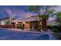 Striking exterior showcasing a modern design with desert landscaping and mountain views at 6525 E Cave Creek Rd # 40, Cave Creek, AZ 85331
