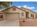 Charming single-story home with a two-car garage and low-maintenance landscaping in a peaceful residential neighborhood at 7716 W Pueblo Ave, Phoenix, AZ 85043