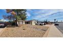 Ranch-style home with low maintenance desert landscaping and plenty of parking space at 7962 W Lincoln St, Peoria, AZ 85345