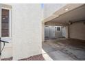 Covered carport area with access to unit doors at 11079 N 110Th Pl, Scottsdale, AZ 85259