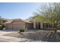 Charming single Gathering home with a three car garage and low maintenance desert landscaping at 18873 N 94Th Way, Scottsdale, AZ 85255