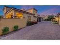 Spacious driveway leads to attached garages of this luxury home with mountain views at 18927 N 101St St, Scottsdale, AZ 85255
