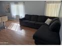 Comfortable living room is bright and airy at 235 W Southern Ave # 150, Mesa, AZ 85210