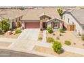 Beautiful aerial view of a single-story home with a well-manicured front yard and inviting curb appeal in a quiet neighborhood at 24638 N 144Th Ave, Surprise, AZ 85387