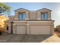 Elegant two-story home featuring a three-car garage and well-maintained landscaping at 33828 N Pate Pl, Cave Creek, AZ 85331