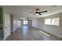 Spacious living area with tile floors, recessed lighting, and neutral paint, perfect for entertaining at 4219 W Citrus Way, Phoenix, AZ 85019